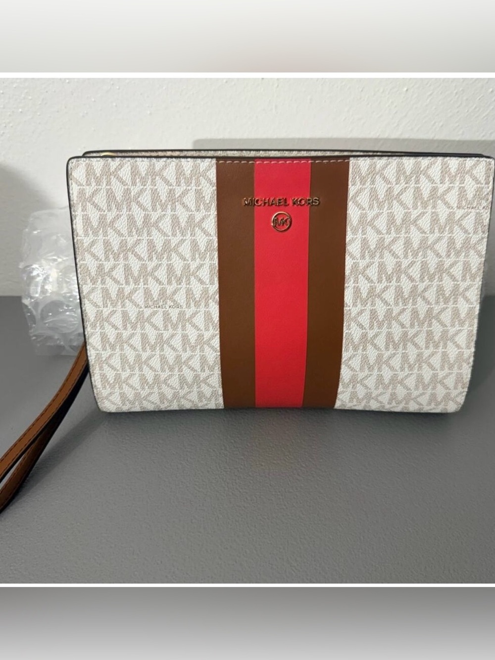 NWOT Michael Kors Beige Monogram Pouch Wrislet